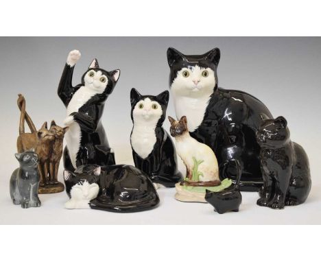 Group of ceramic cat figures, etc of recent manufacture, to include examples by 'Just Cats &amp; Co', 27cm high and smaller (