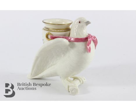 Late 19th century Royal Worcester dove posy vase, realistically modelled as a dove perched on a branch, its wings supporting 