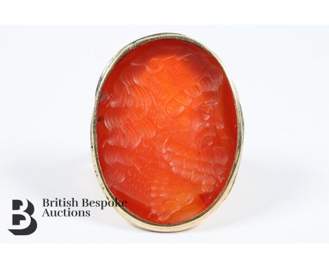 Stunning gentleman's carnelian seal ring, carved with a Grecian figure, approx 30 x 20 mm, size M, approx 9.4 gms (unmarked b