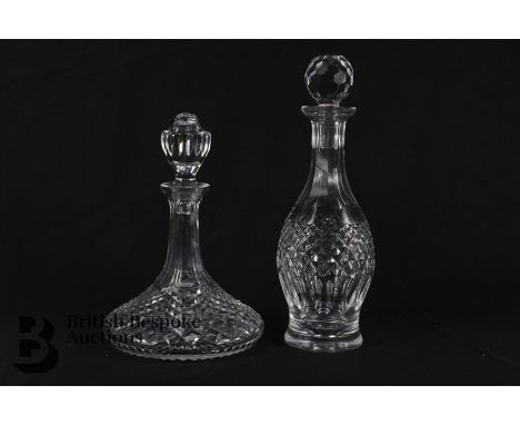 Two cut crystal decanter and stoppers, the first is a ships decanter approx 27 cms h and the other a unmarked decanter and st