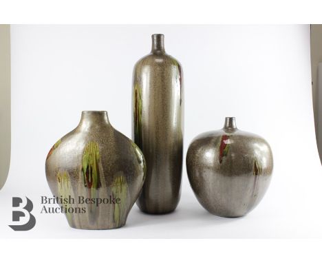 Three 20th century pottery vases, the first is tall cylindrical vase with attractive donkey-grey glaze heightened with olive 