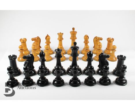 Staunton complete chess set with boxwood and ebony playing pieces and a chess board, together with a bone and ebony dominoes 