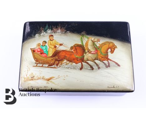 20th century Russian enamel box and cover, painted with figures enjoying a troika ride, approx 13.5 x 9 x 5.5 cms, signed in 