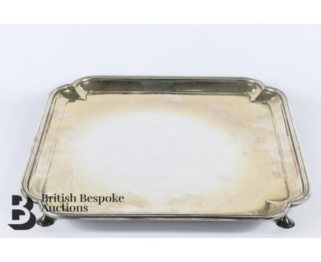 20th century silver tray, London hallmark dated 1958, mm Goldsmiths &amp; Silversmiths, with chamfered corners and raised on 