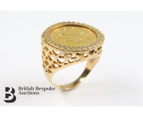 1982 Elizabeth II gold half sovereign ring, in a 9ct gold ring mount size P, approx 8.9 gms.&nbsp;