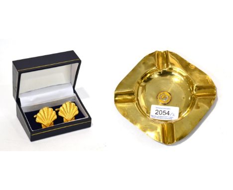 A Shell Brass Counter Top Ashtray, the centre with a small yellow enamel plaque ''Shell Motor Oil Gasoline''; and A Pair of G