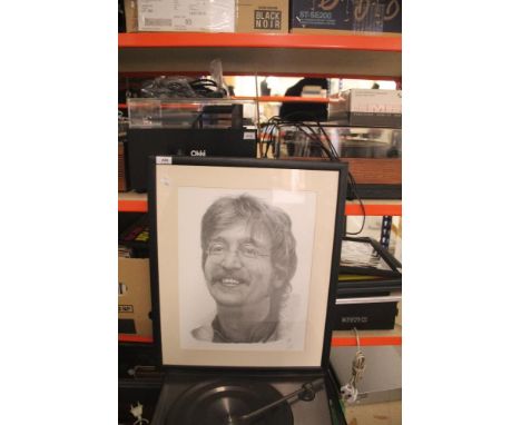 A framed and mounted Beatles / John Lennon pencil sketch print by Chris Burns measuring 47cm by 57cm