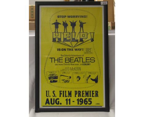 A 59cm by 39cm framed Beatles repro gig print