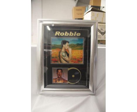 A signed Robbie Williams framed print - 62cm by 48cm - viewing recommended