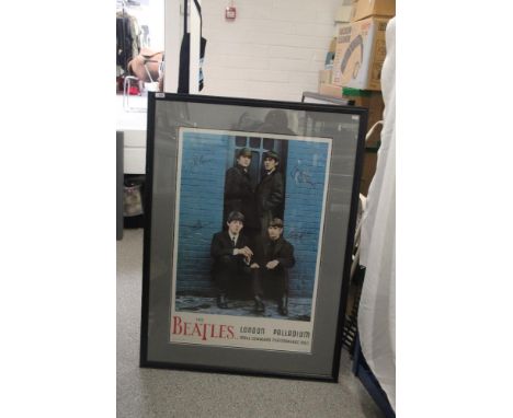 A large framed Beatles print measuring 85cm x 114 cm  ' London Palladium '