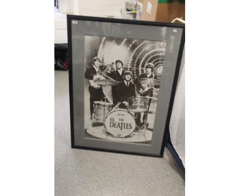 A large framed Beatles print measuring 85cm x 114 cm
