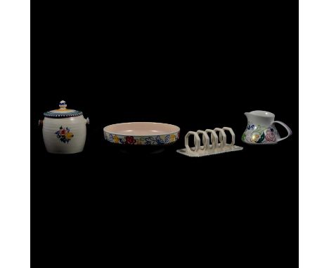 Poole Pottery - a lidded biscuit barrel, floral decoration, wicker handle, 13cm; a shallow bowl, bird and floral border, 20cm