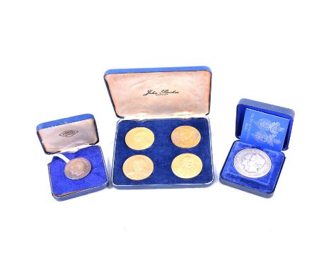 John Pinches set of four Churchill Medals, 24ct gold on Sterling Silver, cased with certificate number 252; silver Royal Wedd
