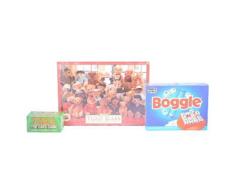 Three boxes of jigsaws, games and puzzles, including sealed 1000piece jigsaws, carpet bowls, board games, etcCondition report