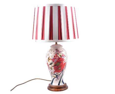A Moorcroft table lamp, Emma Bossons design Family Through Flowers on cream ground, red and cream striped shade, height of la