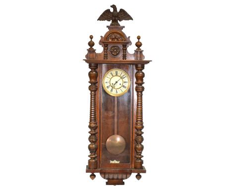 German Vienna style wall clock, walnut caser, circular dial marked for Gustav Becker, the movement striking on a gong, 134cm.