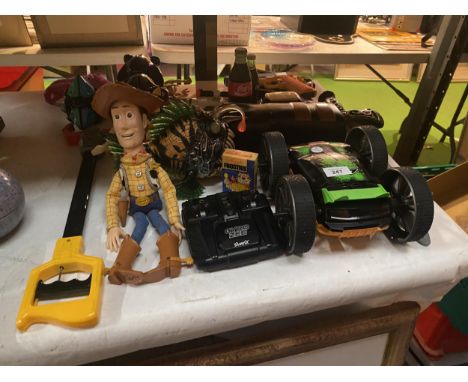 A BOX OF ASSORTED TOYS TO INCLUDE A GYRO ZEE REMOTE CONTROL CAR, TWO SONIC THE HEDGEHOG MONEY BOXES, WOODY FROM TOY STORY, TO