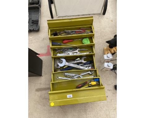 A METAL TOOL BOX CONTAINING AN ASSORTMENT OF SPANNERS, SCREW DRIVERS AND PLIERS ETC 
