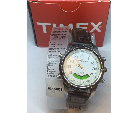A BOXED TIMEX EXPEDITION WRIST WATCH SEEN WORKIBNG BUT NO WARRANTY 