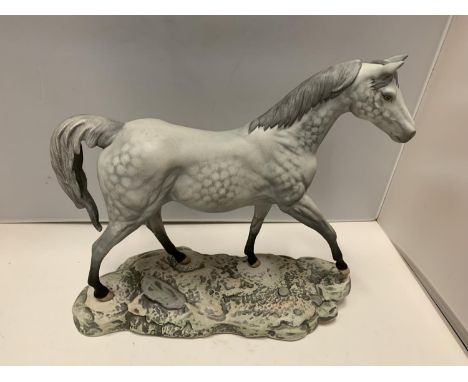 A BESWICK RARE DAPPLE GREY HORSE ON A CERAMIC PLINTH ASLO STAMPED BESWICK 