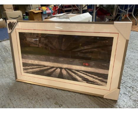 A LARGE PRINT OF A CAR ON A ROAD LOOKING DOWN FROM A TALL BUILDING LIMITED EDITION 25/150 SIGNED T BLINKHORN 