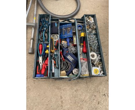 A METAL TOOL BOX CONTAINING A LARGE ASSORTMENT OF TOOLS AND HARDWARE TO INCLUDE AN ELECTRIC DRILL, CHISELS AND SCREW DRIVERS 