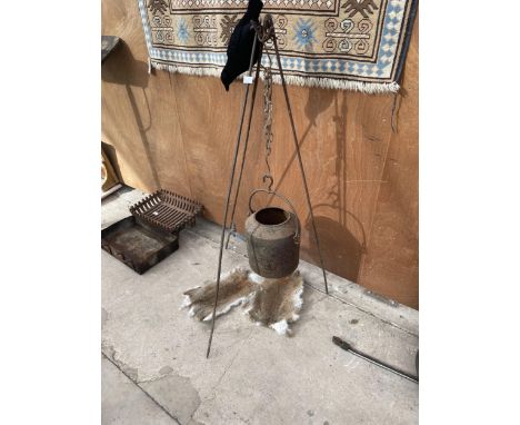 A VINTAGE CAST IRON COULDRON/KETTLE WITH STAND AND CHAIN 