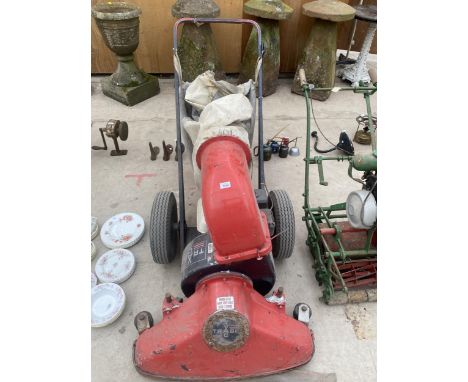 A BILLY GOAT TRASH GARDEN VAC, WITH A HONDA 3.5 HP ENGINE 