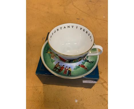 A BOXED ROYAL WORCESTER GOLFING THEME CUP AND SAUCER 