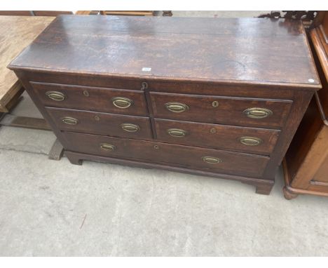 A GEORGE III OAK AND CROSSBANDED LANCASHIRE CHEST ON BRACKET FEET, 55" WIDE 