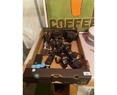 A QUANTITY OF CAMERAS TO INCLUDE A NIKON F50, A MINOLTA 110 ZOOM SLR, CHINON CM-4, CAMERA CASES, A SMALL TRIPOD AND ROLLS OF 