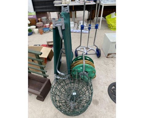 A FOLDING GARDEN CHAIR, A HOSE PIPE ON A REEL AND FIVE WIRE HANGING BASKETS 