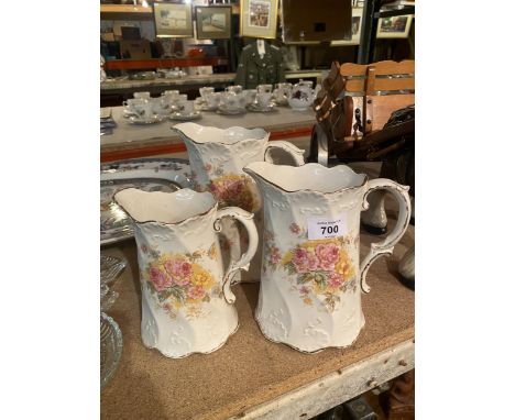 A TRIO OF GRADUATED JUGS MARKED JERSEY K &amp; CO LATE MAYERS TO THE BASE 