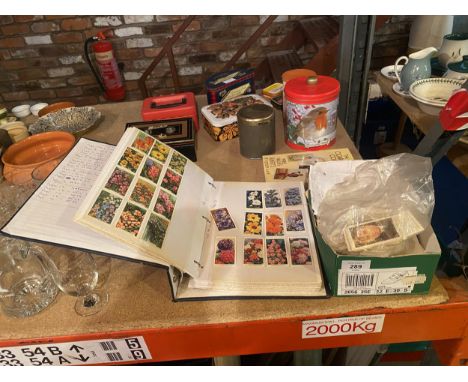 AN ALBUM ONE QUARTER FULL OF CIGARETTE CARDS DEPICTING FLOWERS AND BUTTERFLIES ALSO, A SHOE BOX OF LOOSE CIGARETTE CARDS AND 