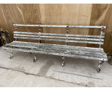 A LARGE VINTAGE WROUGHT IRON AND SLATTED WOODEN GARDEN BENCH 