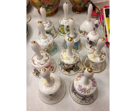 A COLLECTION OF ELEVEN DECORATIVE CERAMIC HAND BELLS 