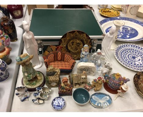 A MIXED COLLECTION OF CERAMIC ORNAMENTS AND A CASE 