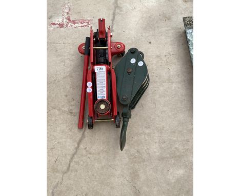 A WINCH PULLEY BRACKET WITH HOOK AND A TROLLEY JACK 