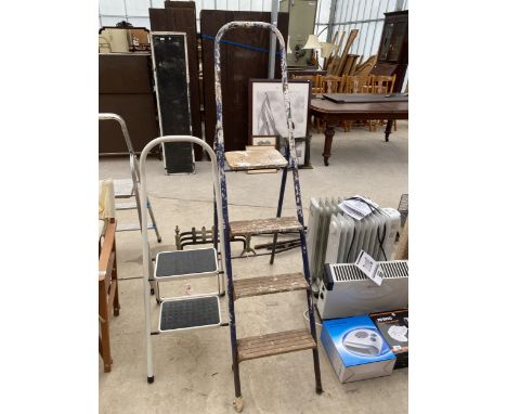 A TUBULAR METAL THREE RUNG STEP LADDER AND A FURTHER SMALL TWO RUNG STEP LADDER 