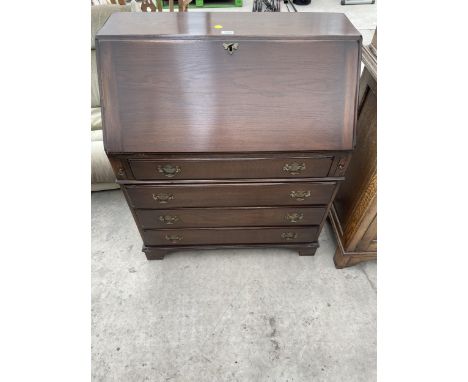A REPRODUCTION OAK FALL FRONT BUREAU ON BRACKET FEET, 33" WIDE 