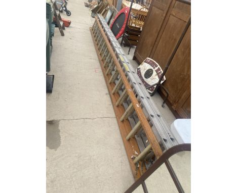 A TWO SECTION WOODEN EXTENDING LADDER (16 RUNG PER SECTION) AND A TWO SECTION ALLUMINIUM EXTENDING LADDER (16 RUNG PER SECTIO