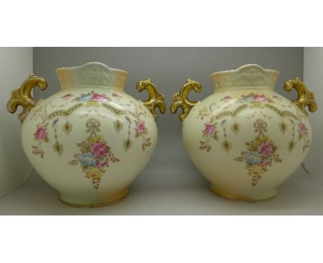 A pair of Crown Devon Fieldings floral decorated vases, marked Perth, RD No. 622805 on base, 18cm