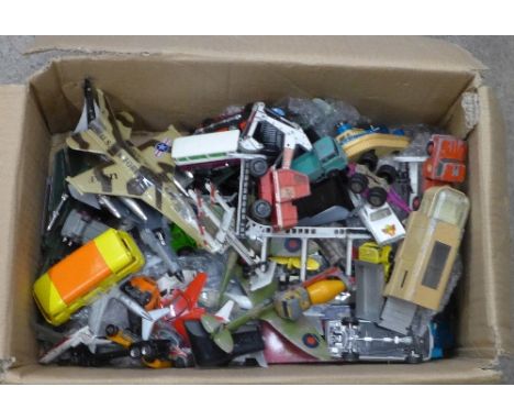 A collection of die-cast model vehicles and six aeroplanes