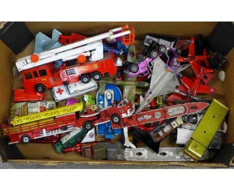 A collection of die-cast model vehicles and six aeroplanes
