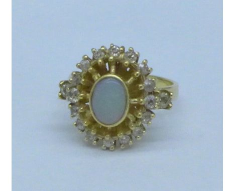 An 18ct gold, opal and diamond ring, 8g, O