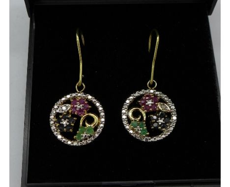 A pair of silver gilt, ruby, emerald, sapphire and diamond earrings