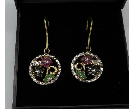 A pair of silver gilt, ruby, emerald, sapphire and diamond earrings