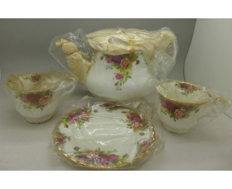 A Royal Albert Old Country Roses 21 piece teaset plus a large teapot, in original boxes