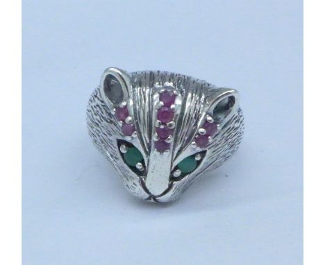 A silver cat ring with emeralds and rubies, R
