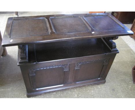Reproduction stained oak monks bench.(B.P. 24% incl. VAT)